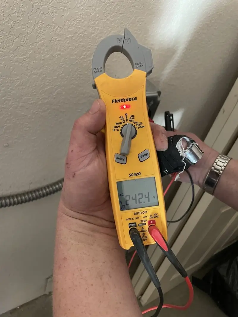 Voltage testing with clamp meter during Whole House Surge Protector in Upper Frederick